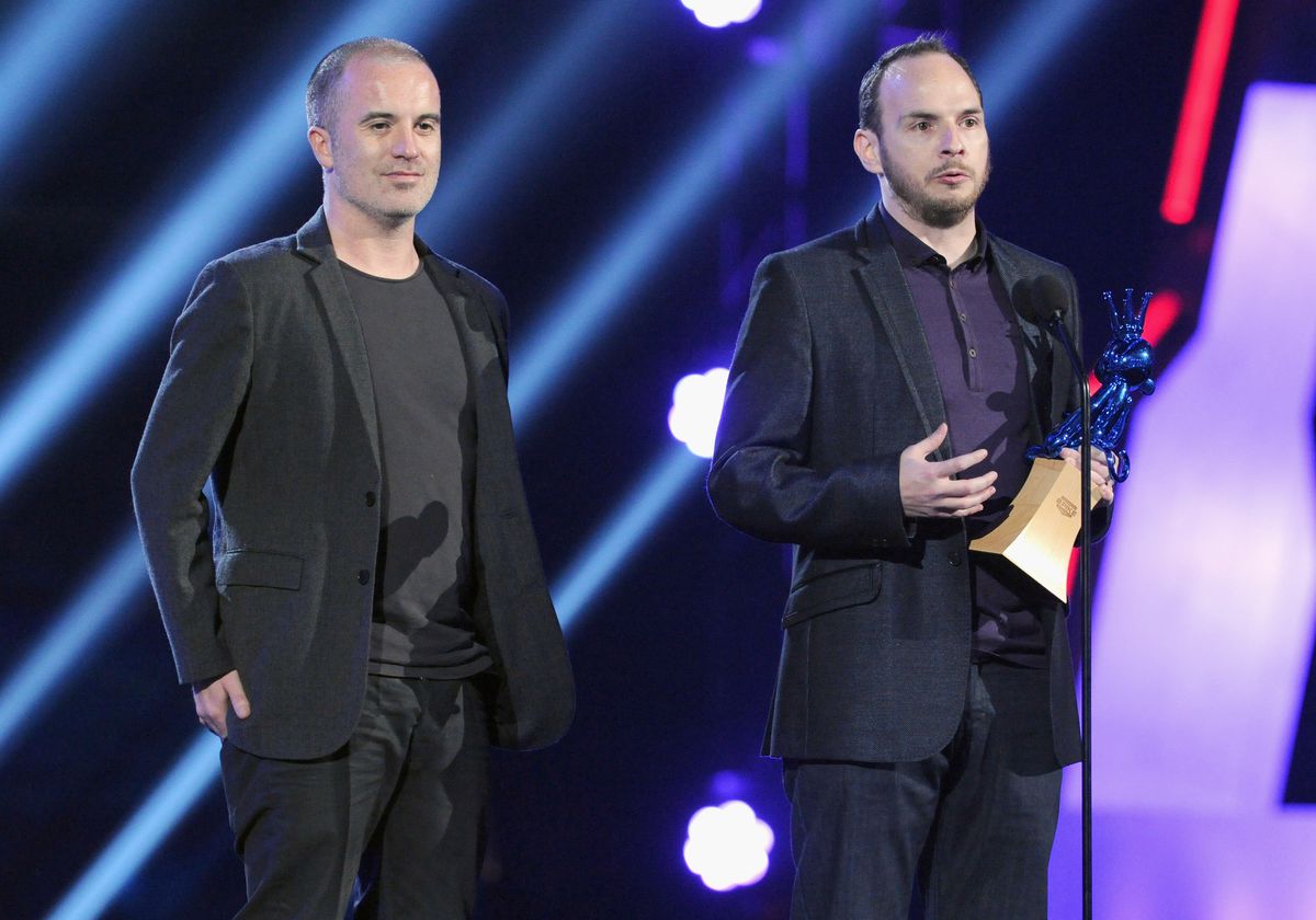 Jamie Walker and Sefton Hill accept the Best Action Adventure Game award for ‘Batman: Arkham City’ onstage at Spike TV’s 2011 Video Game Awards