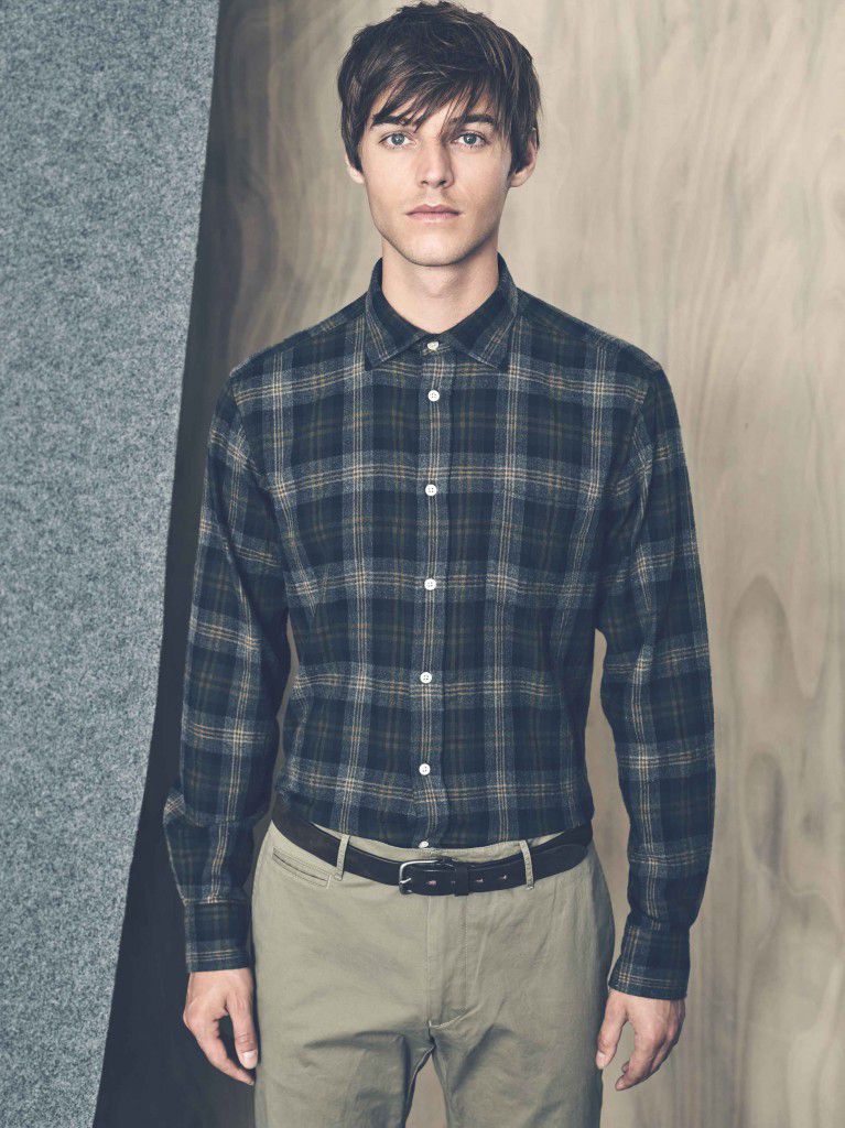 A male model in a Hartford flannel shirt