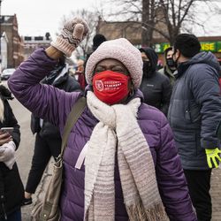 Chicago Teachers Union members and their supporters march and protest Monday in Pilsen after a news conference outside Joseph Jungman Elementary School.