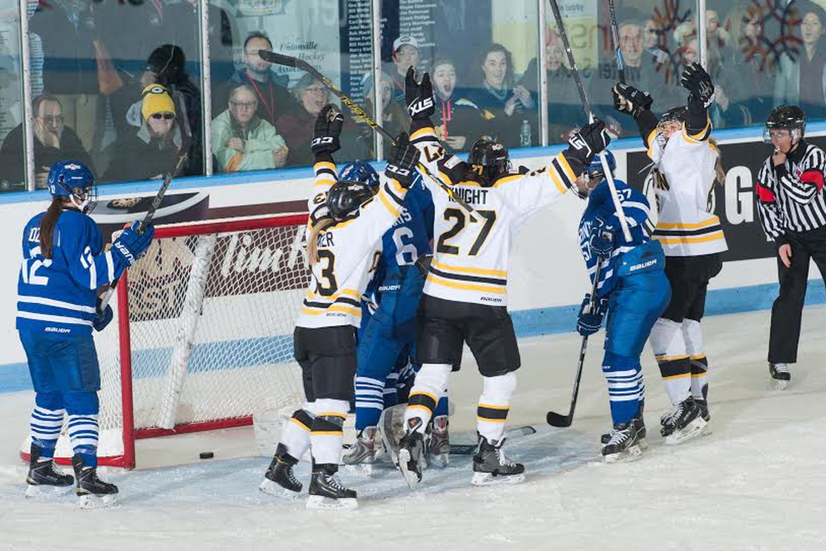 Janine Weber, Hilary Knight, and Brianna Decker celebrate Weber's second goal of the game on the power play in Game 2 of their Clarkson Cup playoff series