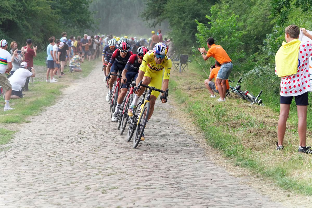 Wout Van Aert of Belgium and Team Jumbo - Visma - Yellow Leader Jersey competes passing through the cobblestones sector #1 of Wallers during the 109th Tour de France 2022, Stage 5 a 157km stage from Lille to Wallers-Arenberg / #TDF2022 / #WorldTour / on July 06, 2022 in Wallers, France.