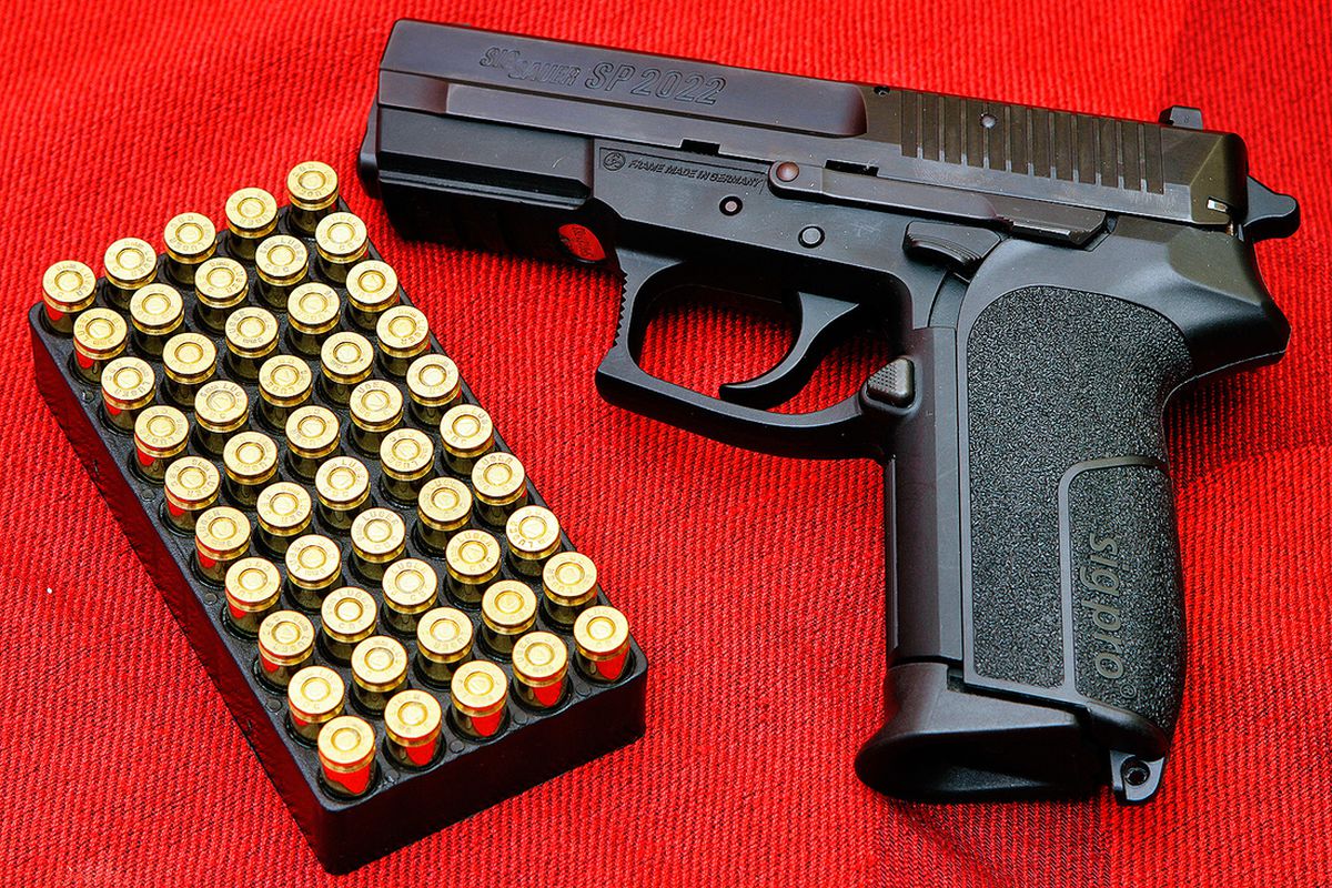 Pistol gun SIG Pro from Wikimedia Commons
