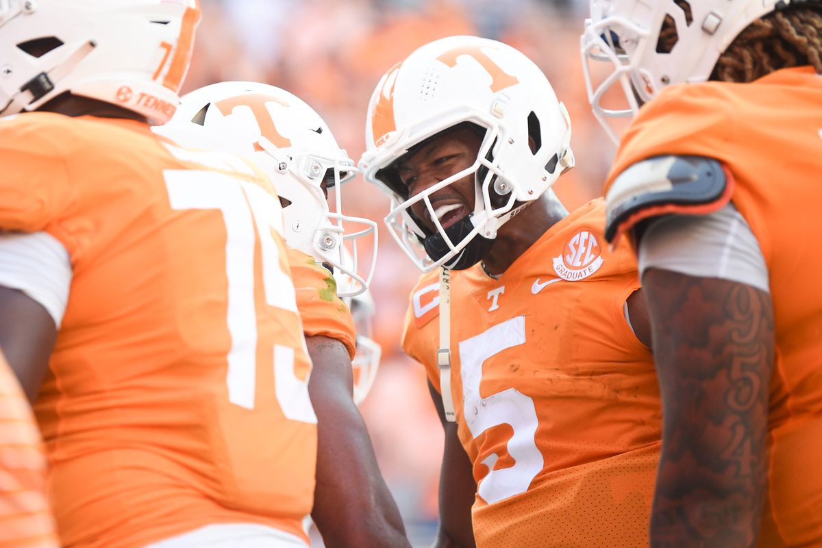 Tennessee quarterback Hendon Hooker congratulates Tennessee wide receiver Bru McCoy on his touchdown during the first half of a game between the Tennessee Vols and Florida Gators, in Neyland Stadium, Saturday, Sept. 24, 2022.
