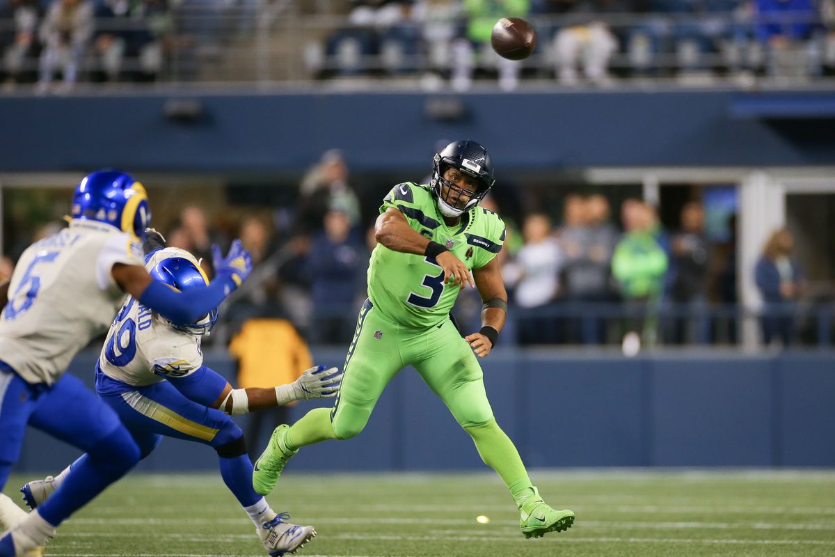 Quarterback Russell Wilson #3 of the Seattle Seahawks makes a throw against the Los Angeles Rams in the second half at Lumen Field on October 7, 2021 in Seattle, Washington.