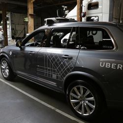 In this photo taken Tuesday, Dec. 13, 2016, an Uber driverless car is displayed in a garage in San Francisco. Uber is bringing a small number of self-driving cars to its ride-hailing service in San Francisco - a move likely to both excite the city’s tech-savvy population and spark a conflict with California regulators. The Wednesday, Dec. 14, launch in Uber’s hometown expands a public pilot program the company started in Pittsburgh in September. 