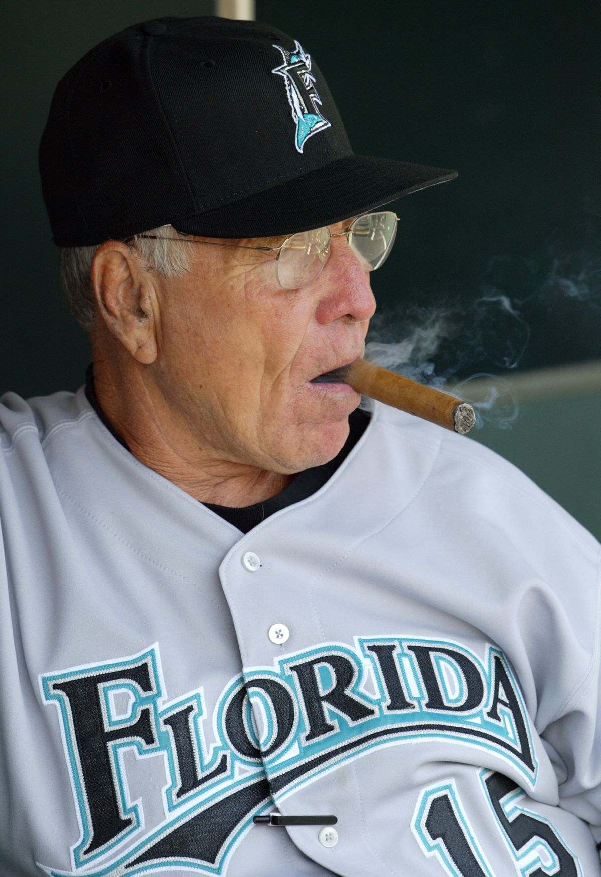 Jack McKeon #15 smokes a cigar