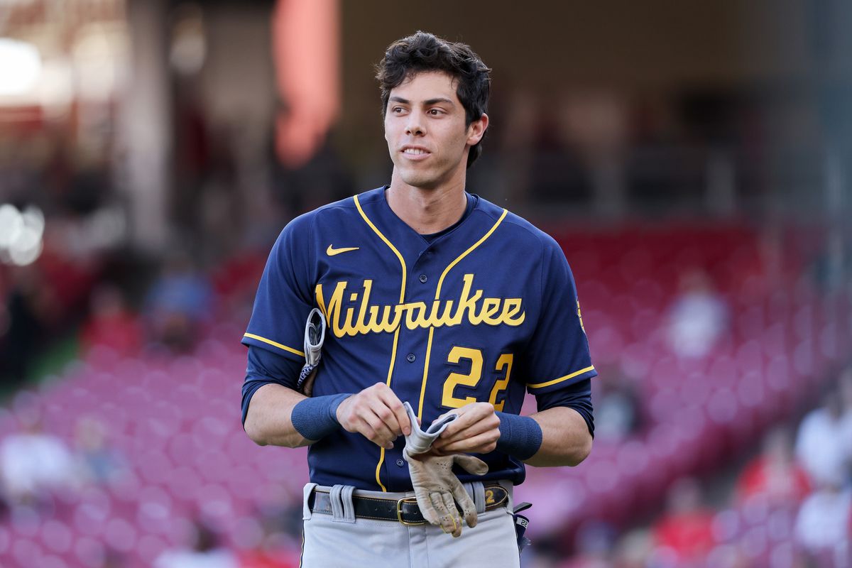 Christian Yelich #22 of the Milwaukee Brewers walks across the field in the first inning against the Cincinnati Reds at Great American Ball Park on May 09, 2022 in Cincinnati, Ohio.