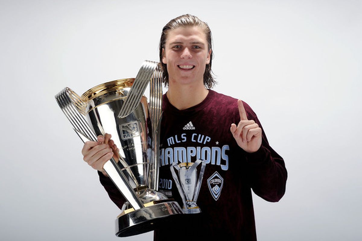 TORONTO ON - NOVEMBER 21: Ross Schunk #13 of the Colorado Rapids poses with the Philip F. Anschutz MLS Cup trophy following the MLS Cup final at BMO Field on November 21 2010 in Toronto Canada.  (Photo by Harry How/Getty Images)
