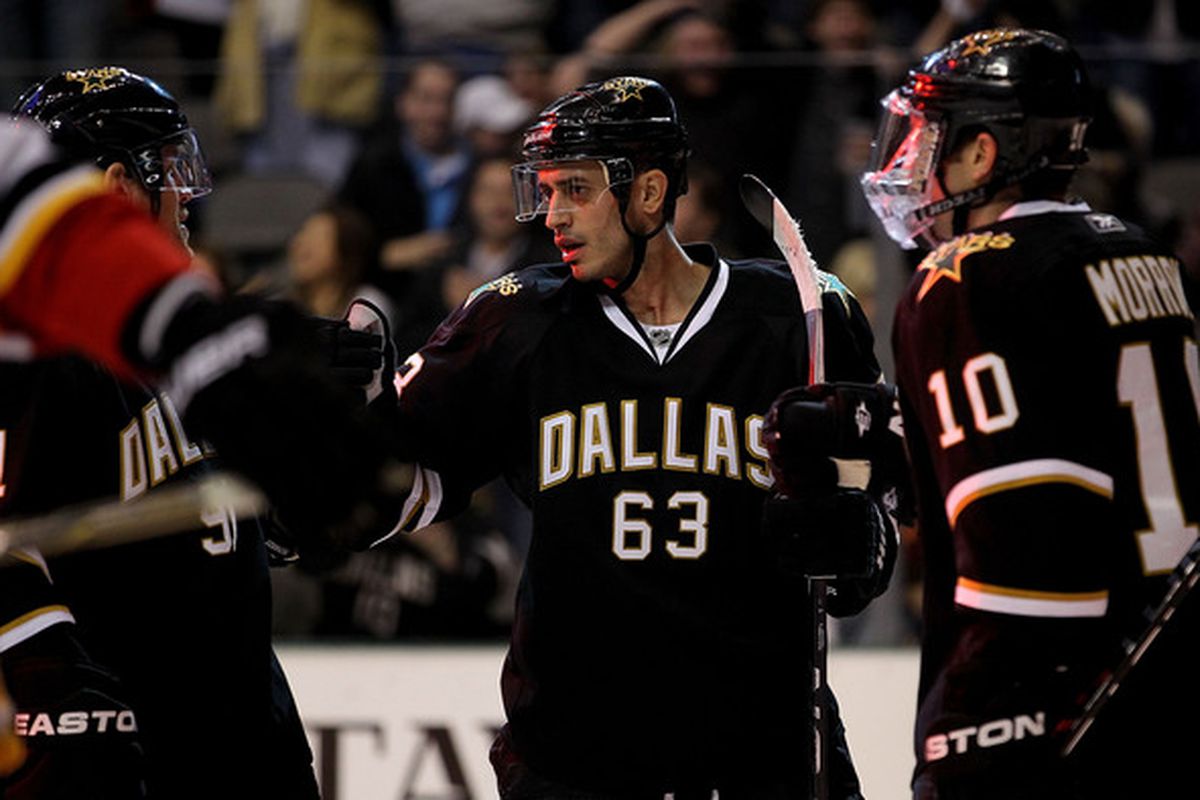 DALLAS TX - DECEMBER 23:   Center Mike Ribeiro #63 of the Dallas Stars celebrates his power play goal against the Calgary Flames at American Airlines Center on December 23 2010 in Dallas Texas.  (Photo by Ronald Martinez/Getty Images)