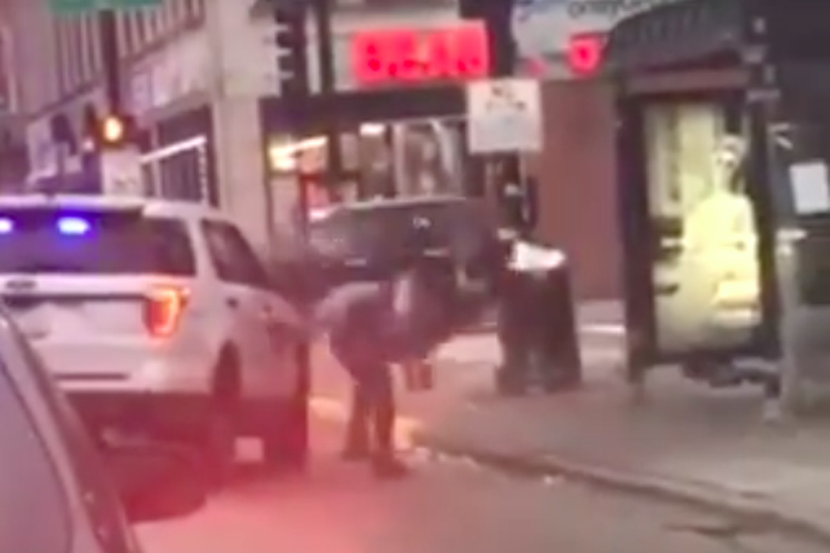 An image taken from a cellphone video that was posted to social media Nov. 28, 2019, shows a Chicago police officer lift a man off his feet and slam him to the ground after he allegedly spit on the officer while being detained for drinking in public.