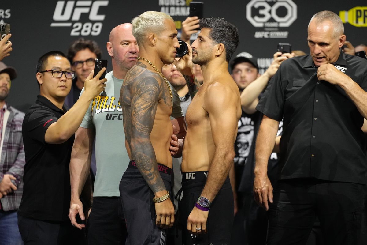 Opponents Charles Oliveira of Brazil and Beneil Dariush of Iran face off during the UFC 289 ceremonial weigh-in at Rogers Arena on June 09, 2023 in Vancouver, British Columbia.