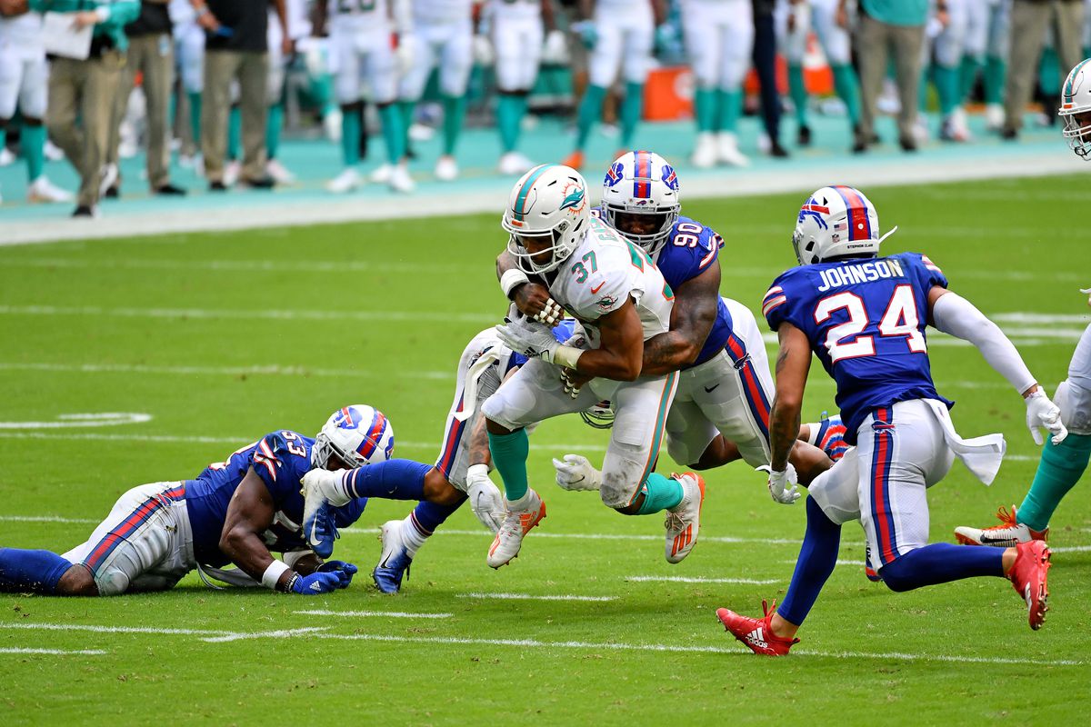 Buffalo Bills defensive tackle Quinton Jefferson wraps up Miami Dolphins running back Myles Gaskin during the second half at Hard Rock Stadium