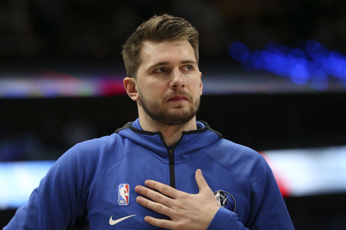 Dallas Mavericks guard Luka Doncic reacts during the national anthem before the game against the Phoenix Suns at American Airlines Center.&nbsp;