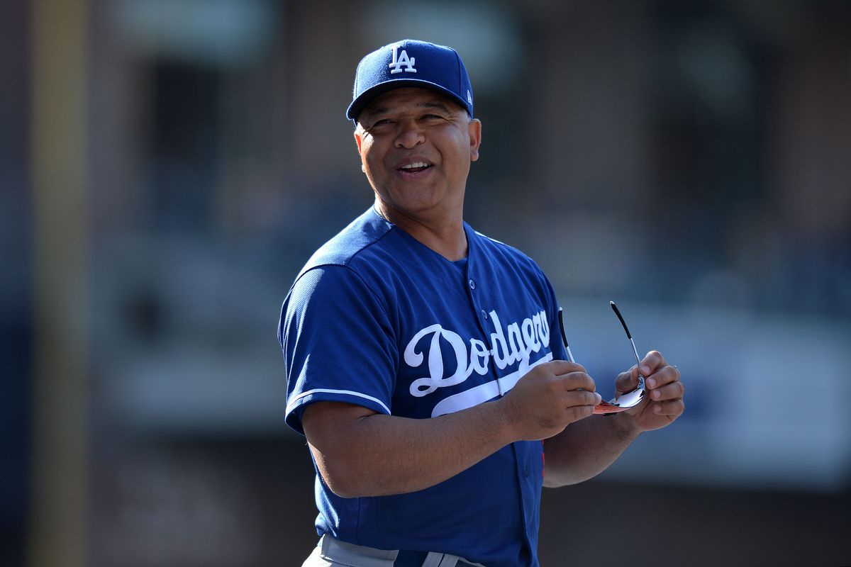 Los Angeles Dodgers manager Dave Roberts laughing