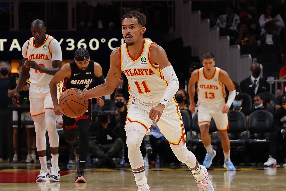 Trae Young #11 of the Atlanta Hawks drives against the Miami Heat during the second half at State Farm Arena on October 14, 2021 in Atlanta, Georgia.&nbsp;