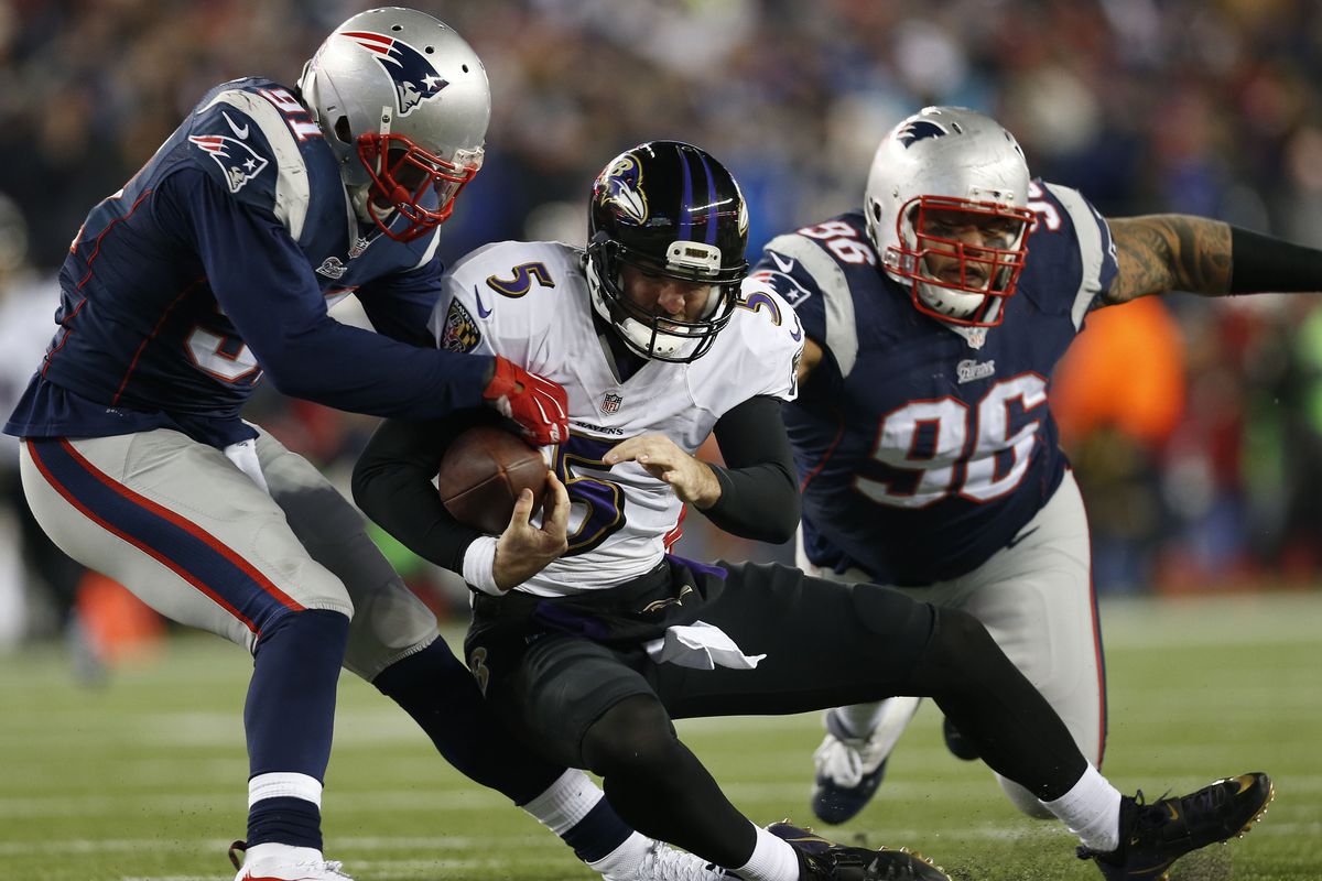 Jamie Collins and Sealver Siliga were robbed by the refs of a strip-sack Flacco special