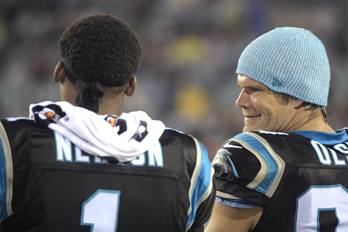 Carolina Panthers quarterback Cam Newton (1) and tight end Greg Olsen, right, watch from the sideline during the first half of an NFL preseason football game against the Jacksonville Jaguars, Thursday, Aug. 24, 2017, in Jacksonville, Fla. (AP Photo/Phelan