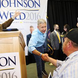 Libertarian presidential candidate Gov. Gary Johnson, right, and running mate Gov. Bill Weld wave to and greet supporters at the Student Union at the University of Utah in Salt Lake City on Saturday, Aug. 6, 2016.