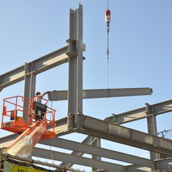 Girder being maneuvered into place in right field - 