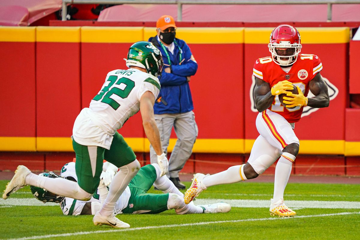 Kansas City Chiefs wide receiver Tyreek Hill (10) scores a touchdown against New York Jets safety Ashtyn Davis (32) during the second half at Arrowhead Stadium.&nbsp;