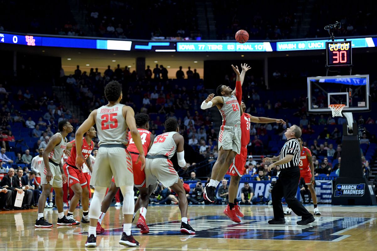 Breaon Brady #24 of the Houston Cougars tips off against Kaleb Wesson #34 of the Ohio State Buckeyes to start their second round game of the 2019 NCAA Men’s Basketball Tournament at BOK Center on March 24, 2019 in Tulsa, Oklahoma.
