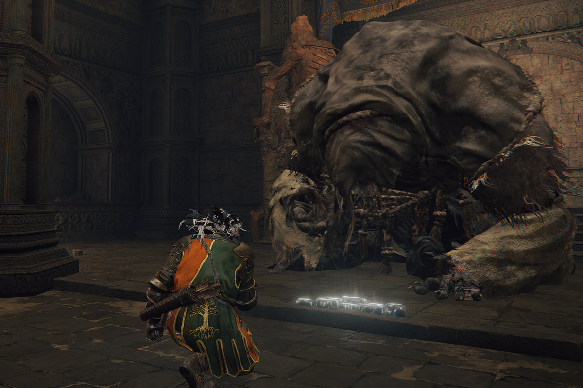 Elden Ring player in the Beast Sanctuary kneeling in front of Beast Priest Gurank.
