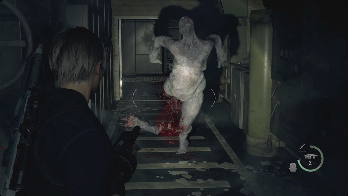 Resident Evil 4&nbsp;remake&nbsp;Leon shooting the leg off of a regenerador