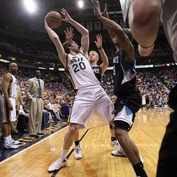 Gordon Hayward of the Utah Jazz handles the ball and is pressured in the last minute of play against Minnesota during NBA basketball in Salt Lake City Friday, April 12, 2013.