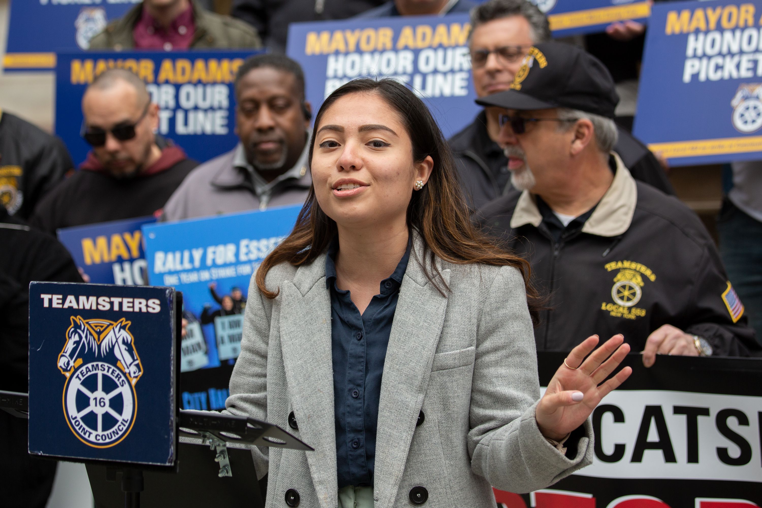 Queens State Senate candidate Kristen Gonzalez speaks at a City Hall rally for striking United Metro Energy workers, April 21, 2022.