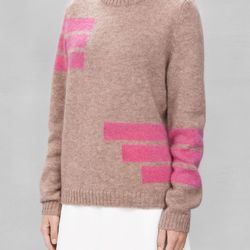 Fuzzy Sweater, <a href="http://www.stories.com/us/Sale/All_sale/Fuzzy_Sweater/590757-100028010.1">$50</a> (was $100) 