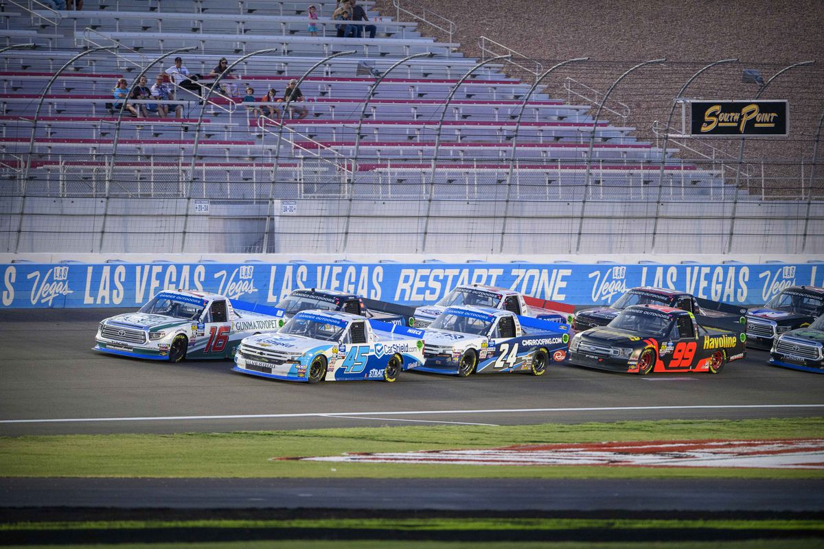 Camping World Truck Series driver Ross Chastain (45) and driver Austin Hill (16) lead the field on a restart during the World of Westgate 200 at Las Vegas Motor Speedway.