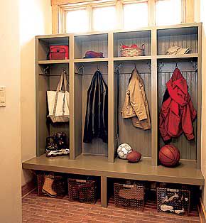 <p>The architect designed built-ins throughout the house to corral clutter, including these mudroom lockers, which the budget-conscious homeowner built.</p>