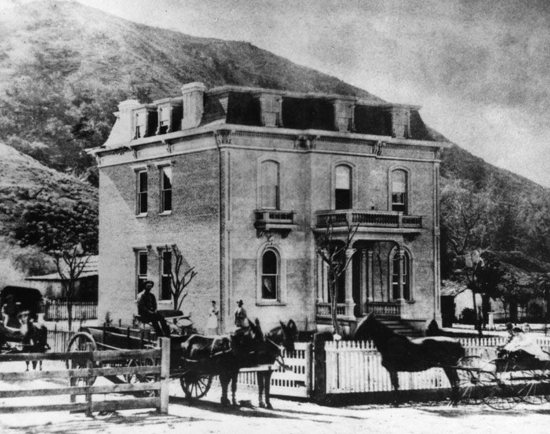 Exterior view of the&nbsp;Louis&nbsp;Phillips&nbsp;adobe in&nbsp;Spadra, now an area of Pomona, prior to 1880. It is a two-story building covered with brick.&nbsp;<br>