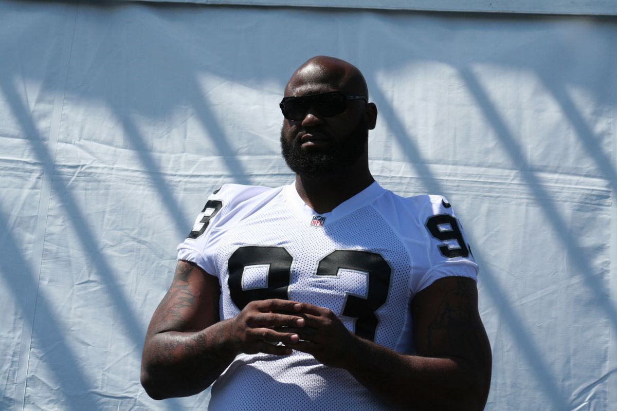 Oakland Raiders defensive tackle Tommy Kelly (photo by Levi Damien)