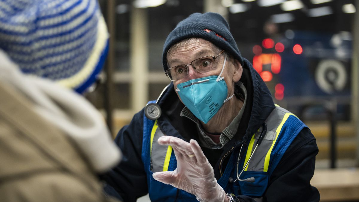 Dr. Ralph Ryan, 69, a retired cardiologist who lives in Elmhurst, volunteers with the Night Ministry and provides free health care at the CTA’s Blue Line Forest Park station, Wednesday night, Feb. 23, 2021. | Ashlee Rezin Garcia/Sun-Times