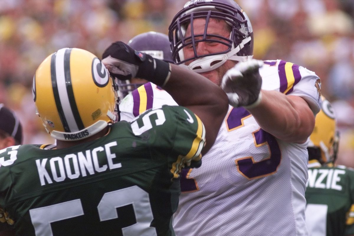 Minnesota Vikings vs green Bay Packers Sept. 26, 1999 — Vikings Todd Steussie shoves Green Bay Packer George Koonce in the 2nd quarter after Randall Cunningham was stopped short of the goal line. The Vikings scored on the next play on a Leroy Hoard short
