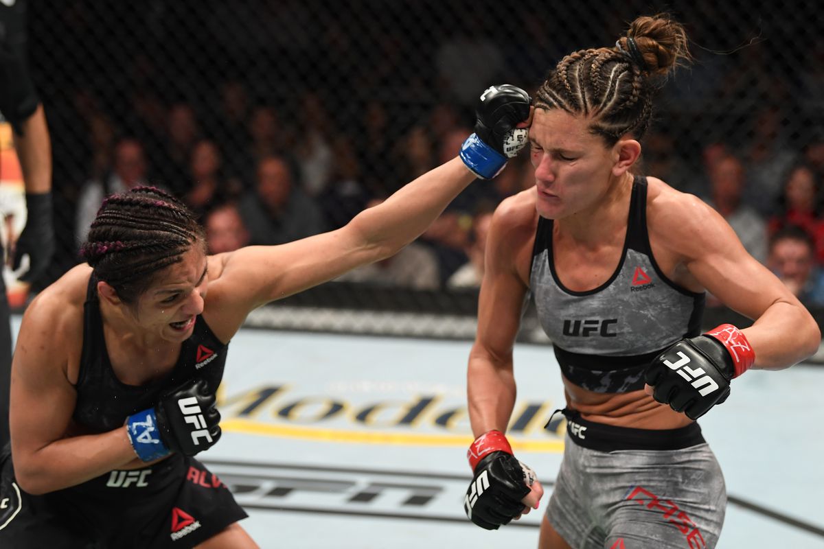 Cynthia Calvillo punches Cortney Casey in their women’s strawweight bout during the UFC Fight Night event at Talking Stick Resort Arena on February 17, 2019 in Phoenix, Arizona.