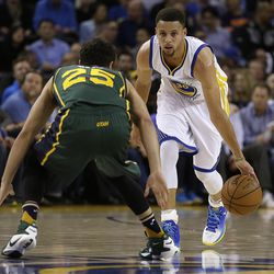 Golden State Warriors' Stephen Curry, right, drives the ball against Utah Jazz's Raul Neto (25) during the first half of an NBA basketball game Wednesday, March 9, 2016, in Oakland, Calif. (AP Photo/Ben Margot)