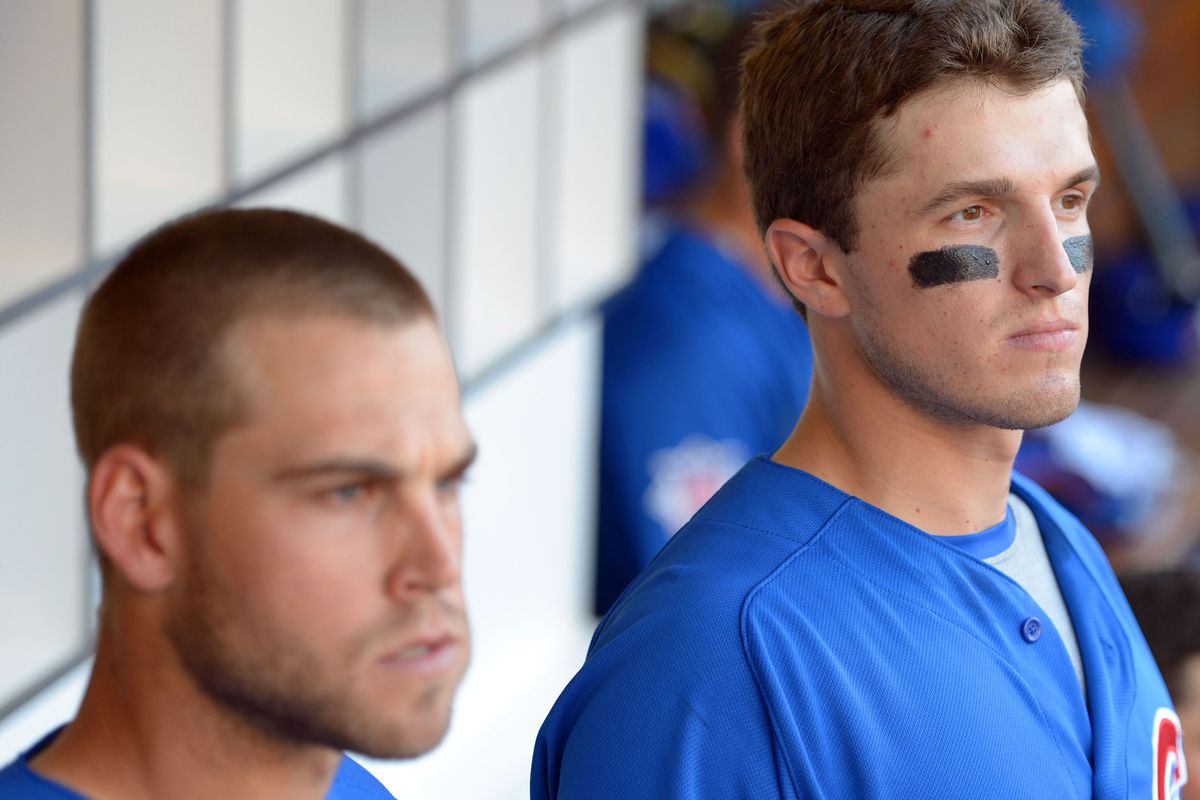 Chicago Cubs third baseman Josh Vitters (right) and center fielder Brett Jackson (left) in the dugout during the eighth inning against the San Diego Padres at Petco Park. Credit: Jake Roth-US PRESSWIRE