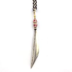 Persian Suicide. If there’s a way to die by your own hand, this is it. Hand engraved sterling silver with rubies in a peppered rose gold hilt and 18k yellow gold accents.