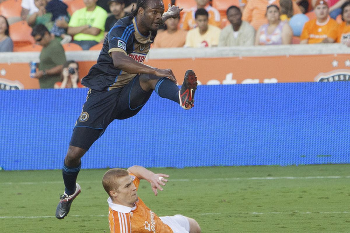 HOUSTON, TX - JUNE 30: Jorge  Perlaza #16 of the  Philadelphia Union shoots over a block attempt by Andre Hainault #31 of the Houston Dynamo at BBVA Compass Stadium on June 30, 2012 in Houston, Texas.  (Photo by Bob Levey/Getty Images)