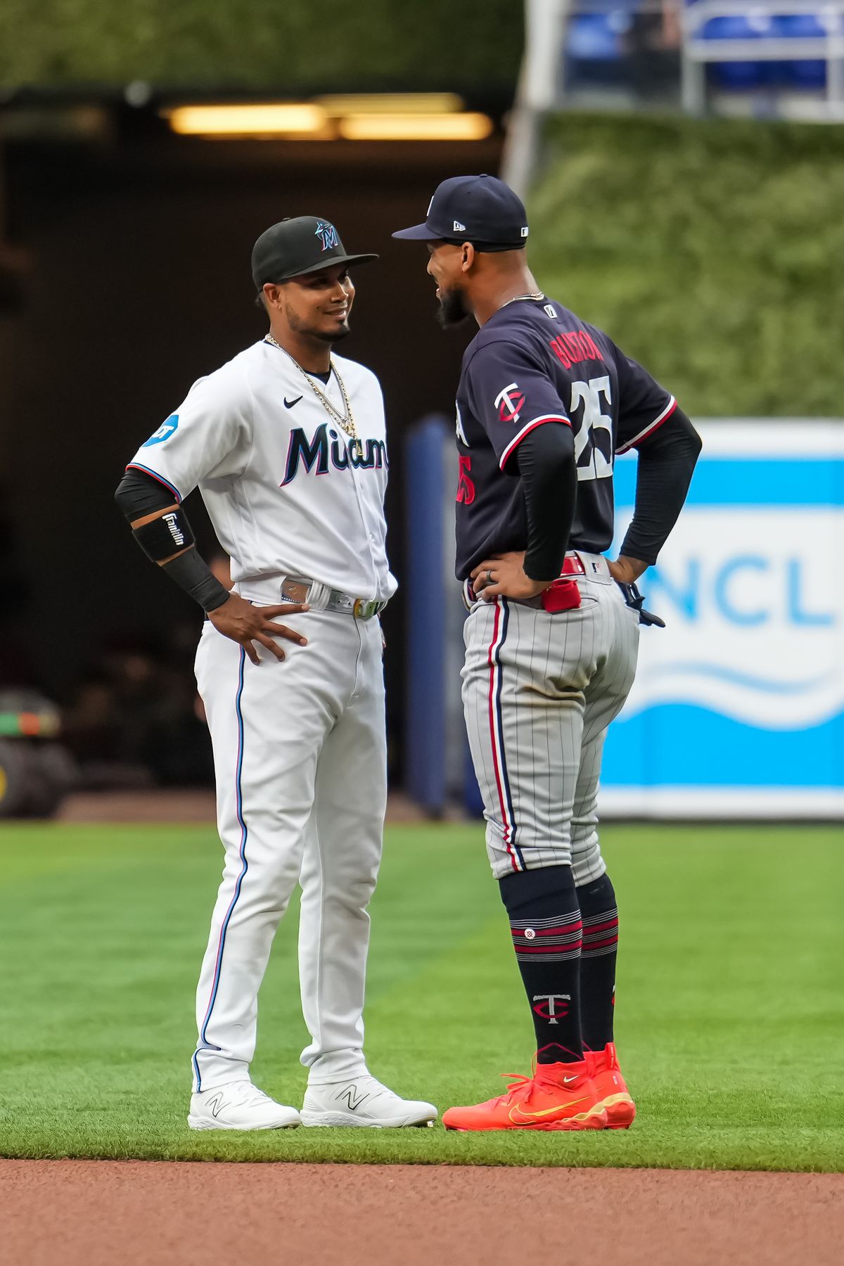 Luis Arraez #3 of the Miami Marlins looks on with Byron Buxton #25 of the Minnesota Twins prior to the game on April 3, 2023 at loanDepot park in Miami, Florida.