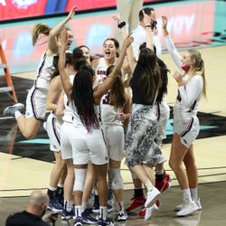 Gonzaga team members celebrate their win over BYU in the WCC women’s basketball tournament finals at the Orleans Arena in Las Vegas on Tuesday, March 9, 2021. Gonzaga won 43-42.