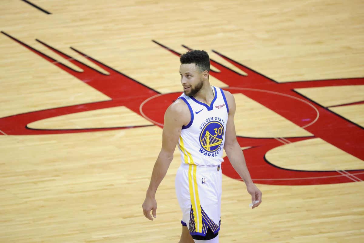 Golden State Warriors guard Stephen Curry looks on during the third quarter against the Houston Rockets at Toyota Center.