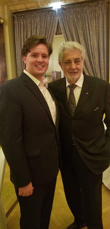 Jonah Hoskins, left, is pictured with renowned tenor Placido Domingo.