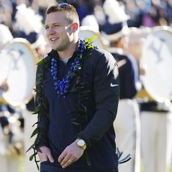 Brigham Young Cougars quarterback Taysom Hill (4) and other seniors are honored prior to the game against Fresno in Provo Saturday, Nov. 21, 2015. BYU won 52-10.