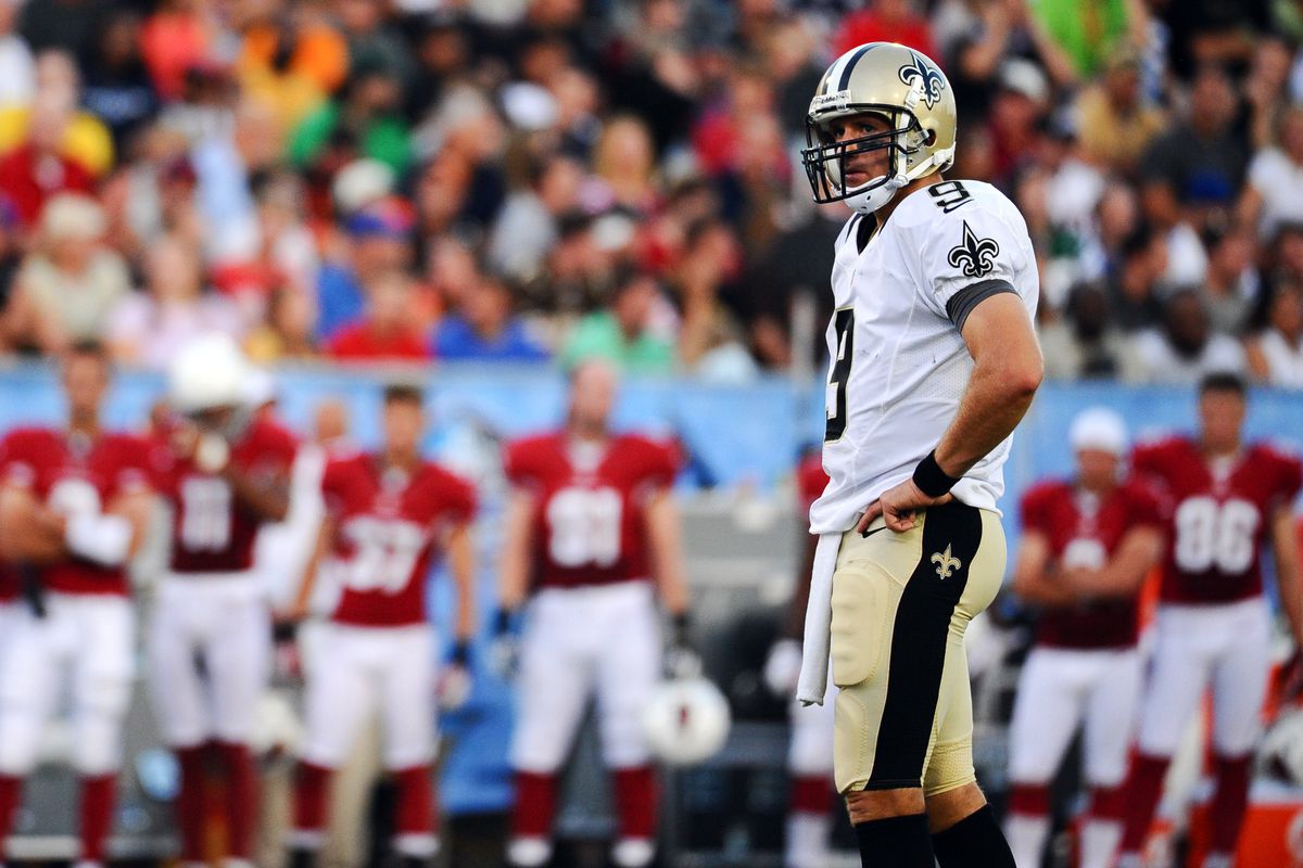 Aug 5, 2012; Canton, OH, USA; New Orleans Saints quarterback Drew Brees (9) during the first quarter of a preseason game against the Arizona Cardinals at Fawcett Stadium. Mandatory Credit: Tim Fuller-US PRESSWIRE