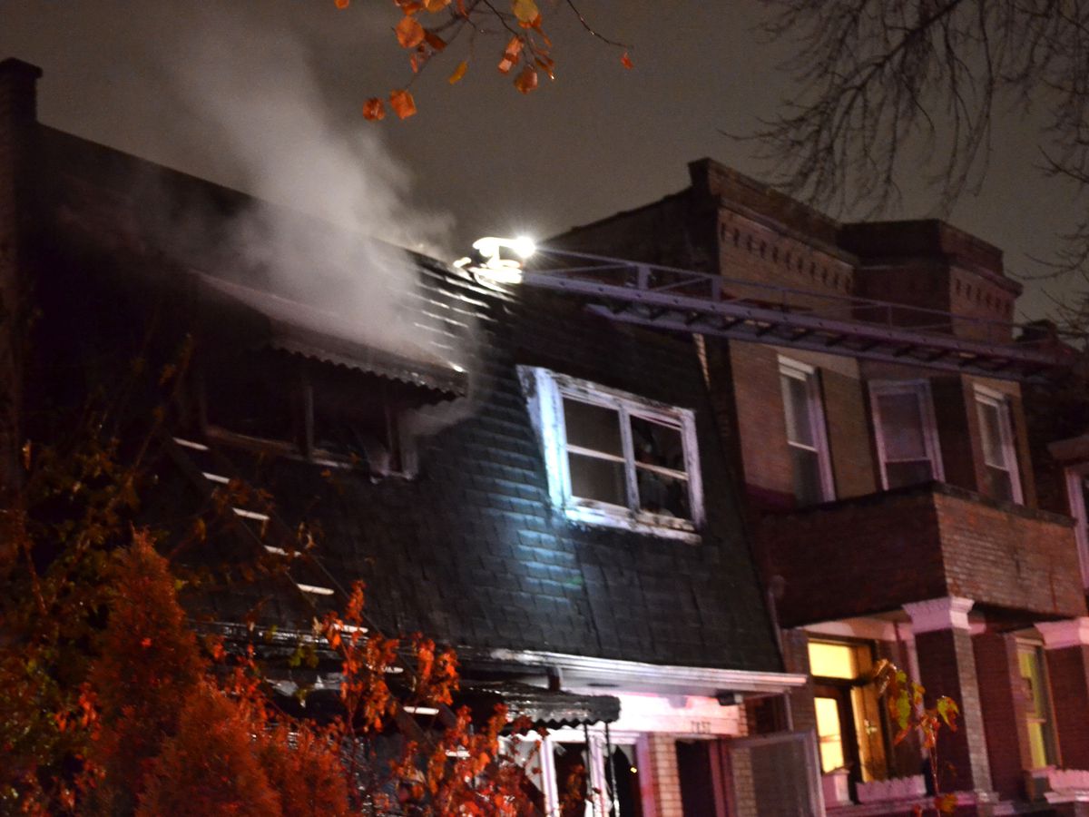 Fire officials investigate a fire about 4 a.m. Friday, November 9, 2018 in the 7800 block of South Sangamon Avenue in Chicago. | Justin Jackson/ Sun-Times