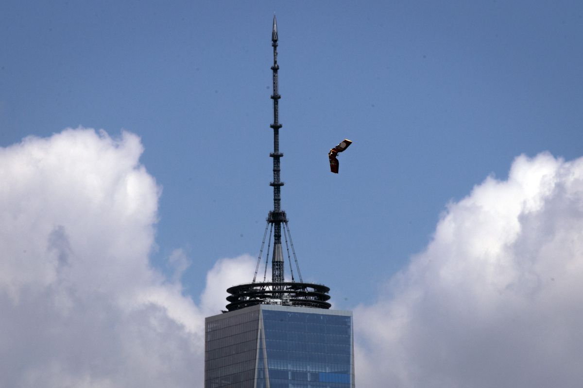 A winged drone flying past the spire of One World Trade Center in New York City in 2016.