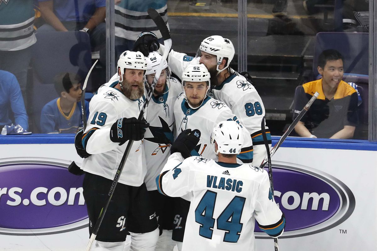 San Jose Sharks center Joe Thornton (19) is congratulated by center Melker Karlsson (68) and center Lukas Radil (52) and defenseman Brent Burns (88) and defenseman Marc-Edouard Vlasic (44) after scoring a goal against the St. Louis Blues during the first 